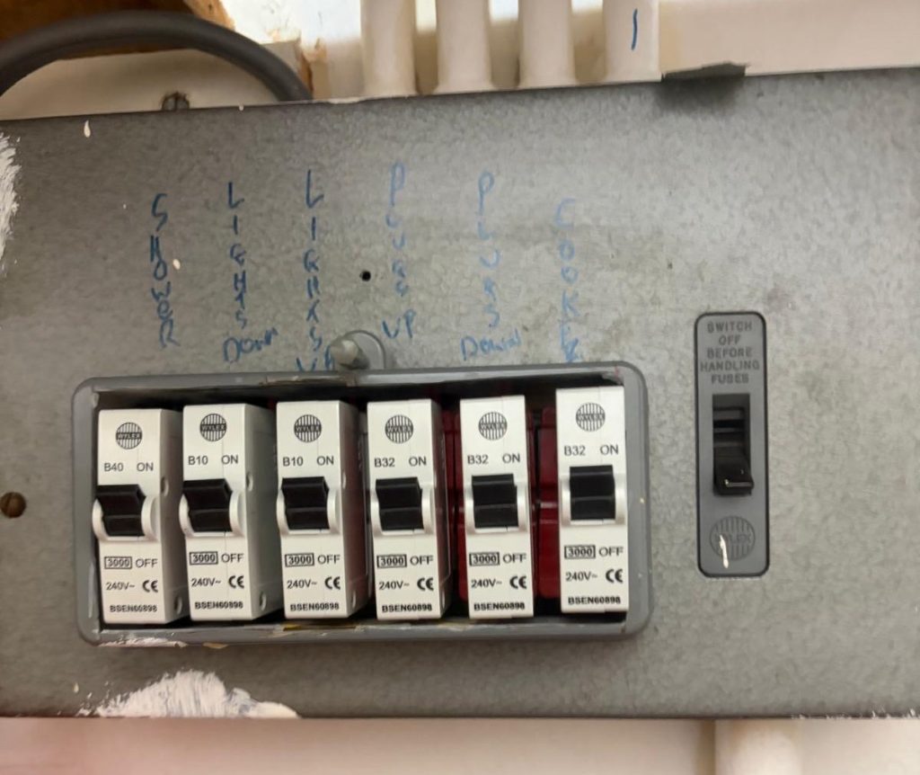 Old consumer unit before upgrade at a terraced house in N16